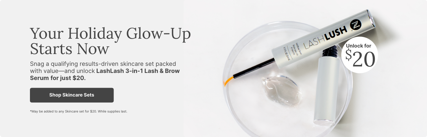 Holiday skincare promotion featuring LashLash 3-in-1 Lash & Brow Serum on a clear dish with gel, highlighting limited-time $20 offer when purchased with qualifying skincare sets.